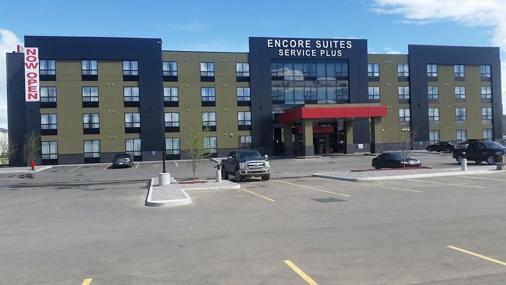 Фото Encore Suites by Service Plus Inns