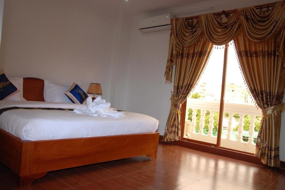 Фото Emerald Bb Battambang Hotel