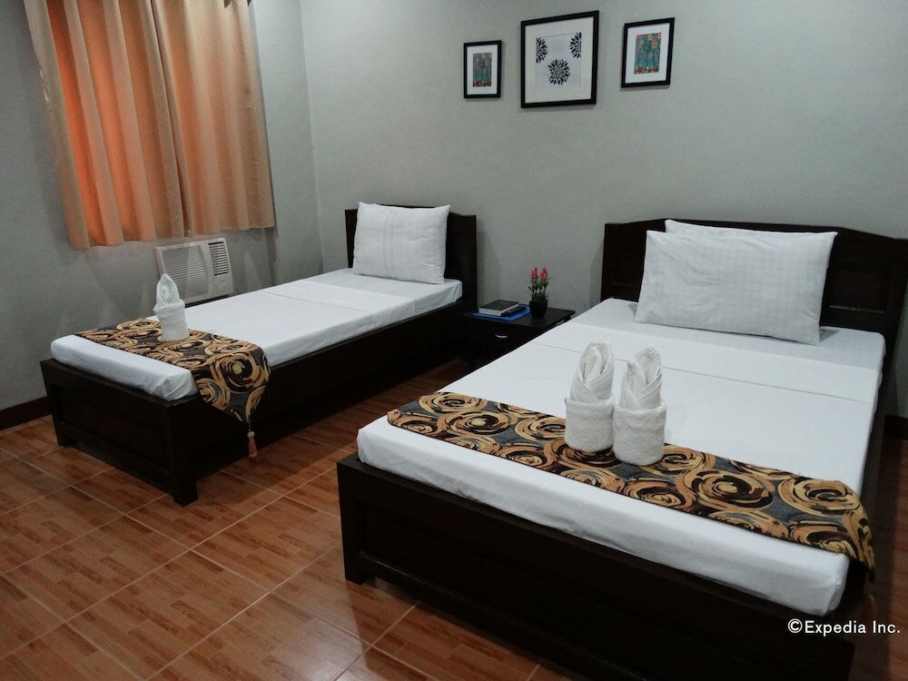 Фото Harbour Gardens Tourist Inn