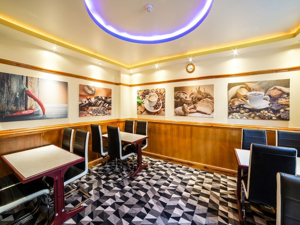 Фото Oyo Vegas Hotel