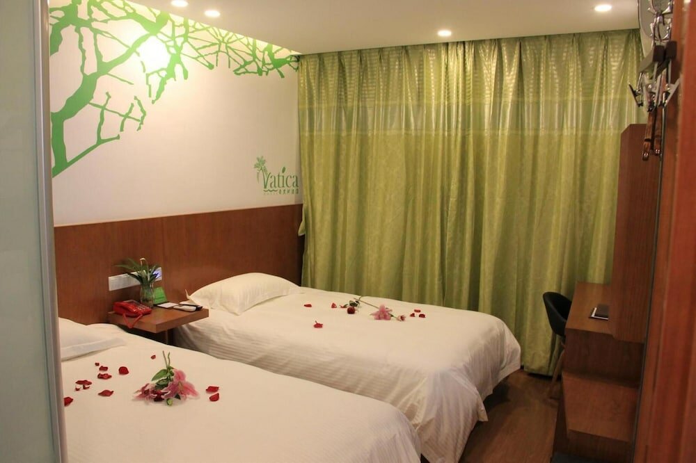 Фото Vatica ZaoZhuang TengZhou Railway Station Hotel