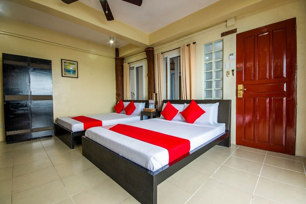 Фото Oyo 130 Jy Crown Palace - Hostel