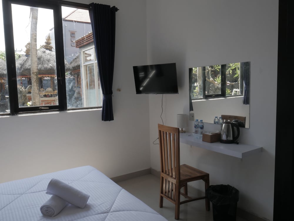 Фото S8 Suardana Hotel