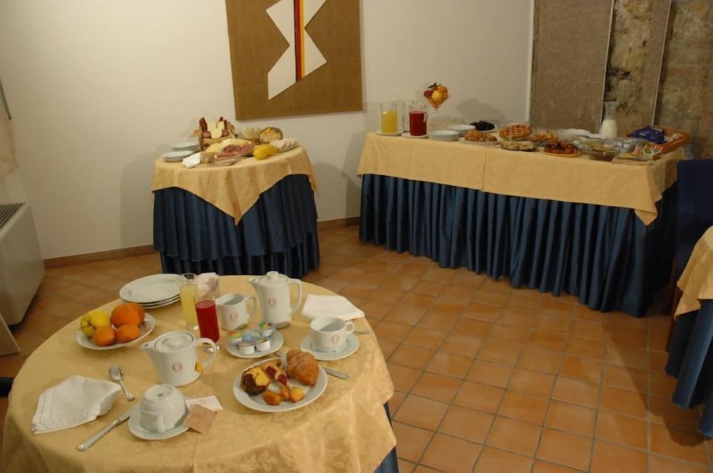 Фото Caravaggio Hotel