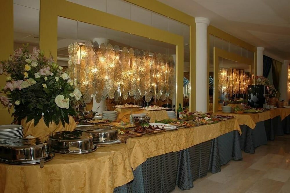 Фото Domizia Palace Hotel