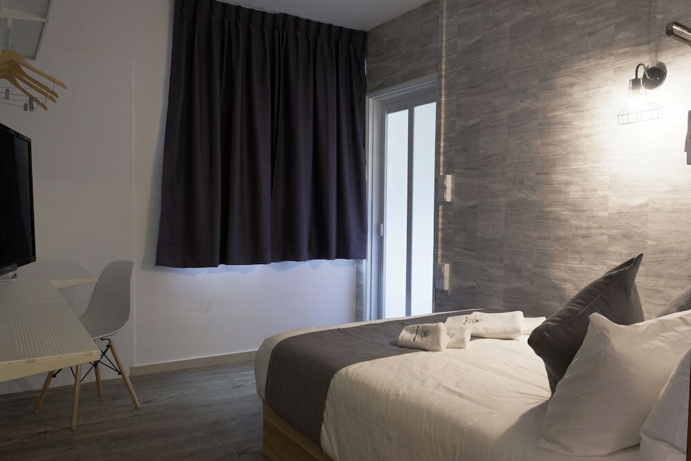 Фото Q Loft Hotels@Bedok