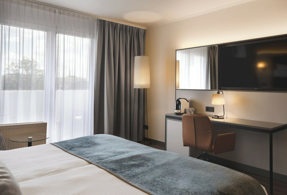 Фото Leonardo Hotel Heidelberg City Center