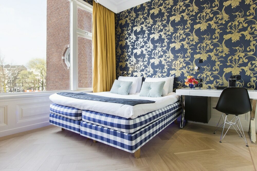 Фото The Amsterdam Canal Hotel