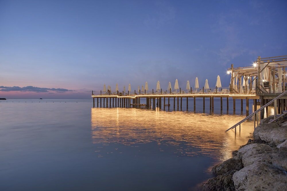 Фото Merit Crystal Cove Hotel