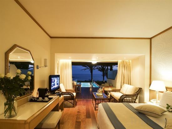 Фото Constantinou Bros Athena Beach Hotel