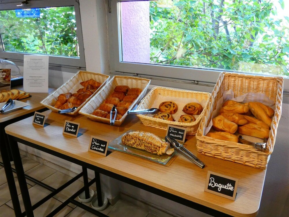 Фото Kyriad Montpellier Aeroport Gare Tgv Sud de France