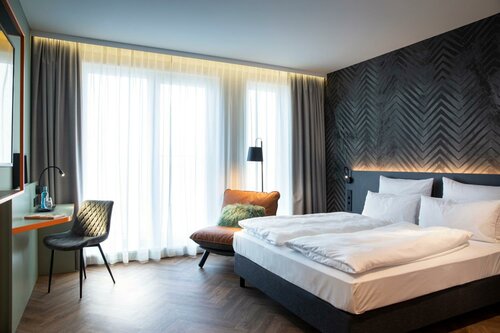 Гостиница Loginn Hotel Berlin Airport в Берлине