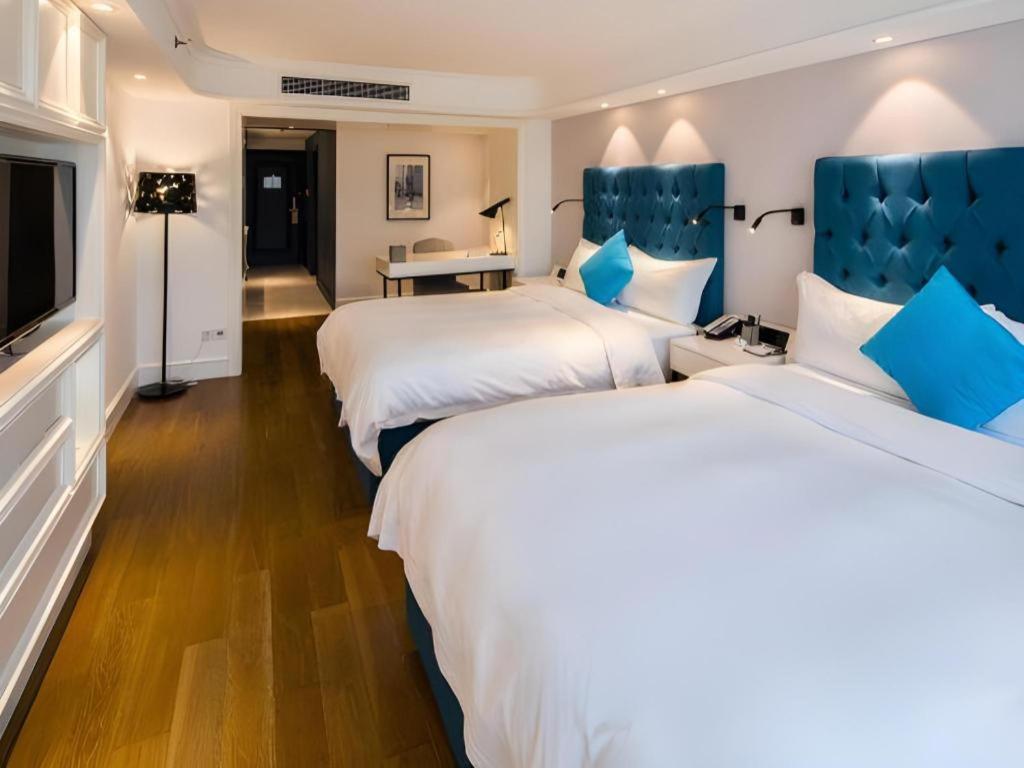 Фото Shanghai Jinchen Hotel