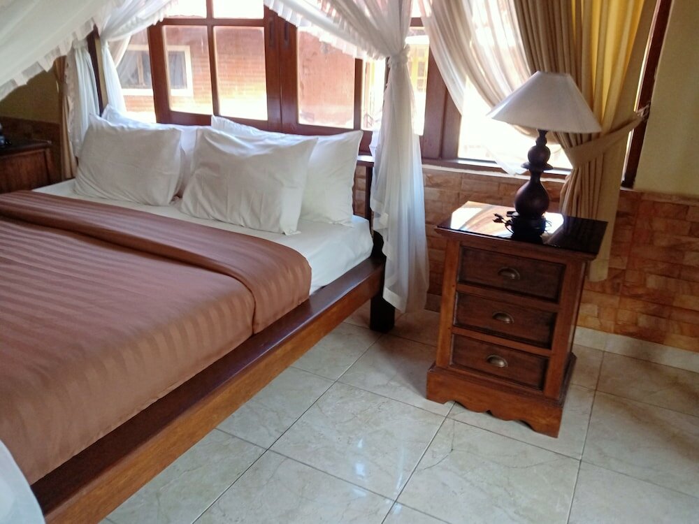 Фото Monkey Forest Bungalow