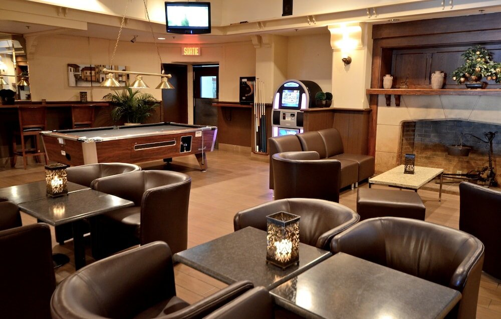 Фото Armon Plaza Montreal Airpt, Trademark Collection by Wyndham