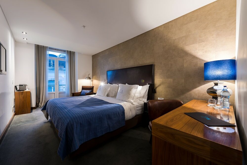 Фото Lisboa Carmo Hotel