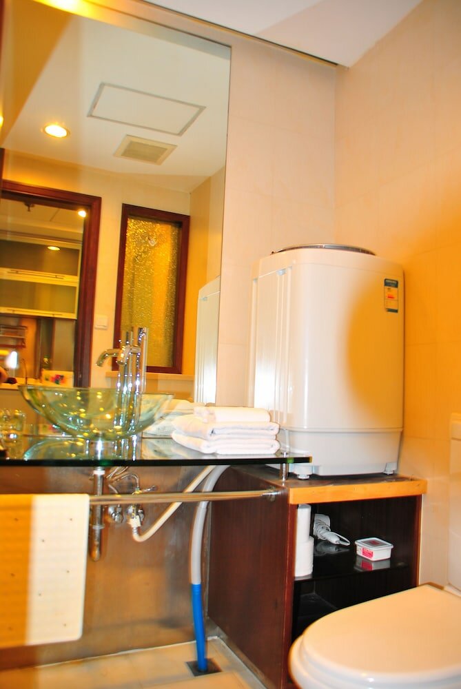 Фото Shanghai Abest Xinshikong Apartments