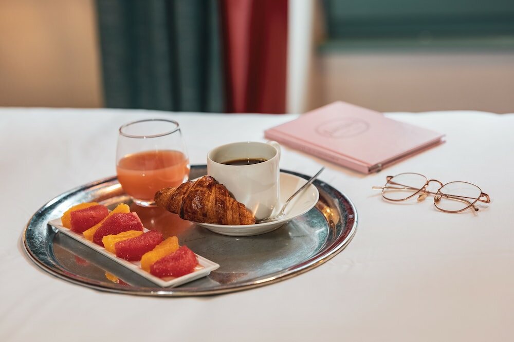 Фото Hôtel Le Petit Paris