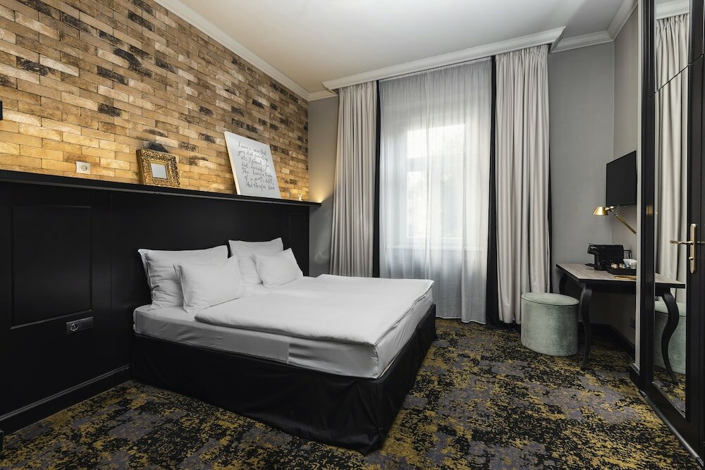 Фото Numa Root Rooms & Apartments