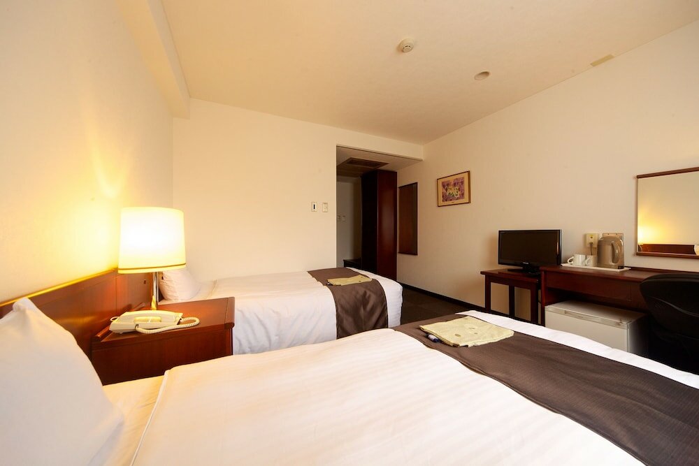 Фото Kochi Sunrise Hotel