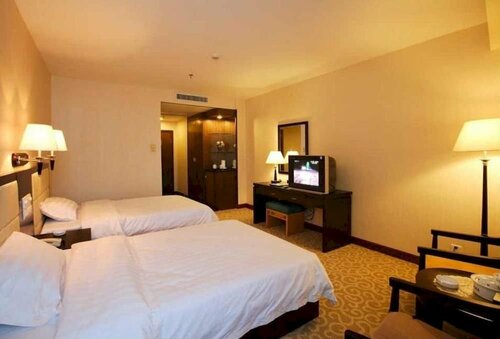 Гостиница International Exhibition and Convention Tocasi Hotel (Swatow Suning Plaza Mixc City Store) в Шаньтоу