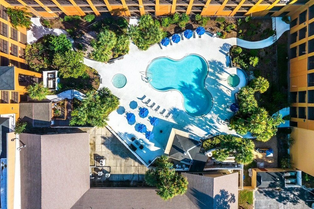 Фото Mi Casa Hotel