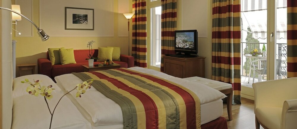 Фото E-Rooms Minusio