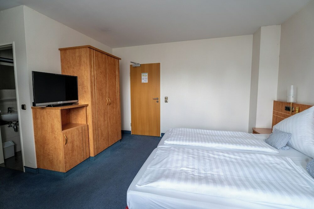 Фото Airport Businesshotel Koeln