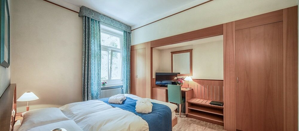 Фото E-Rooms Minusio