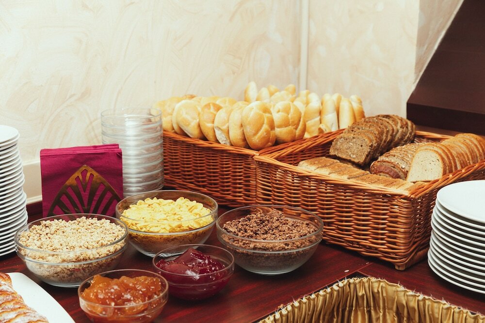 Фото Amigo City Centre Hotel