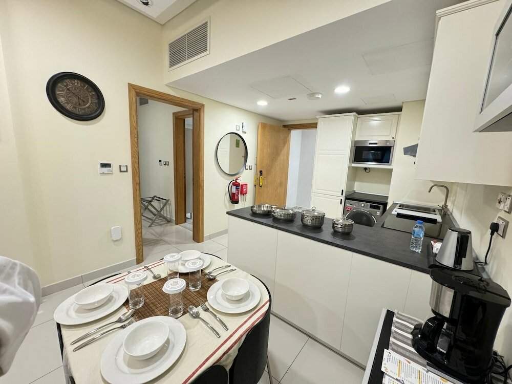 Фото Al Manzil Residence & Suites