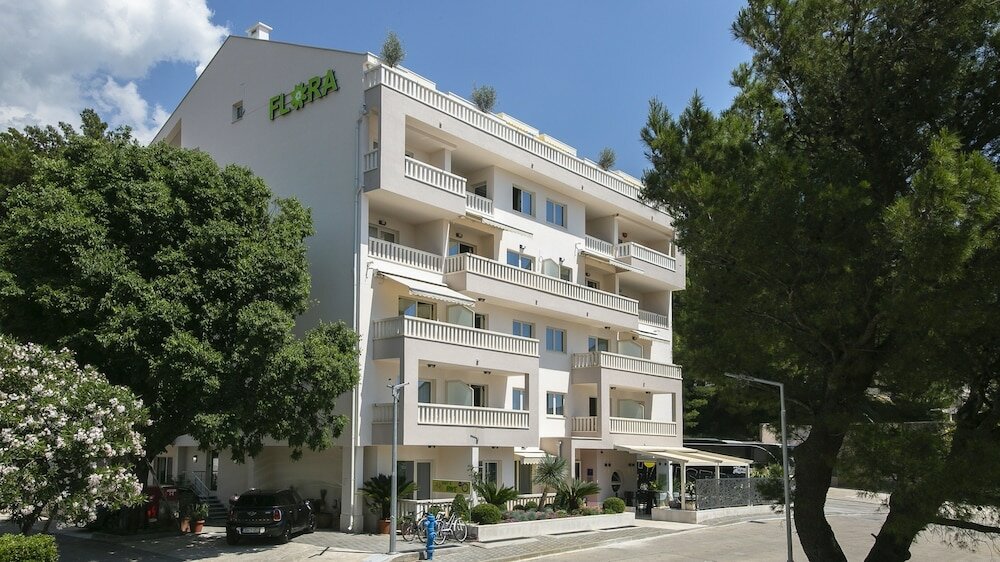 Фото Aparthotel Flora