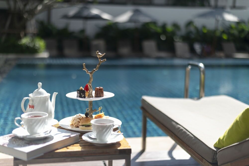 Фото Woodlands Suites Serviced Residences