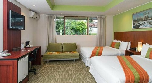 Гостиница Terrazas de Golf Boutique Hotel в Эредии