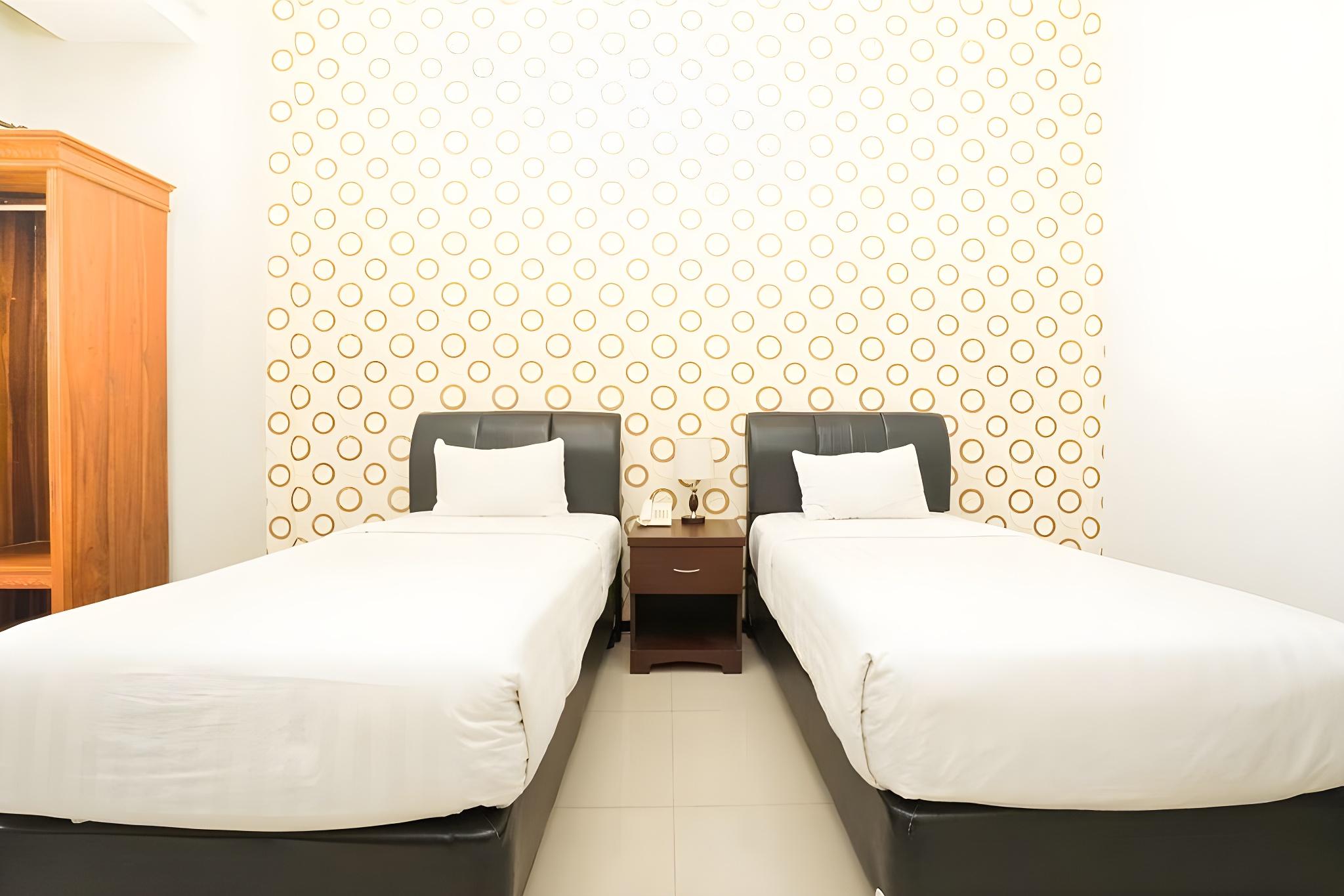 Фото Oyo 282 Putri Utari Guest House