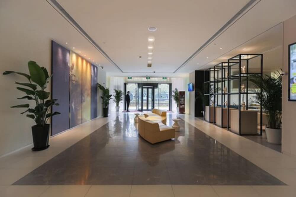 Фото Jinjiang Metropolo Hua Ting Guest House