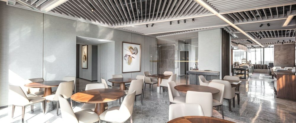 Фото Fraser Suites Dalian
