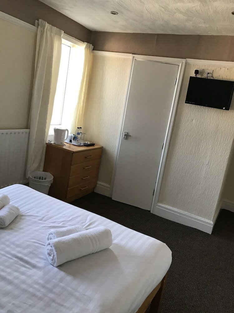 Фото Queens Plaza Hotel