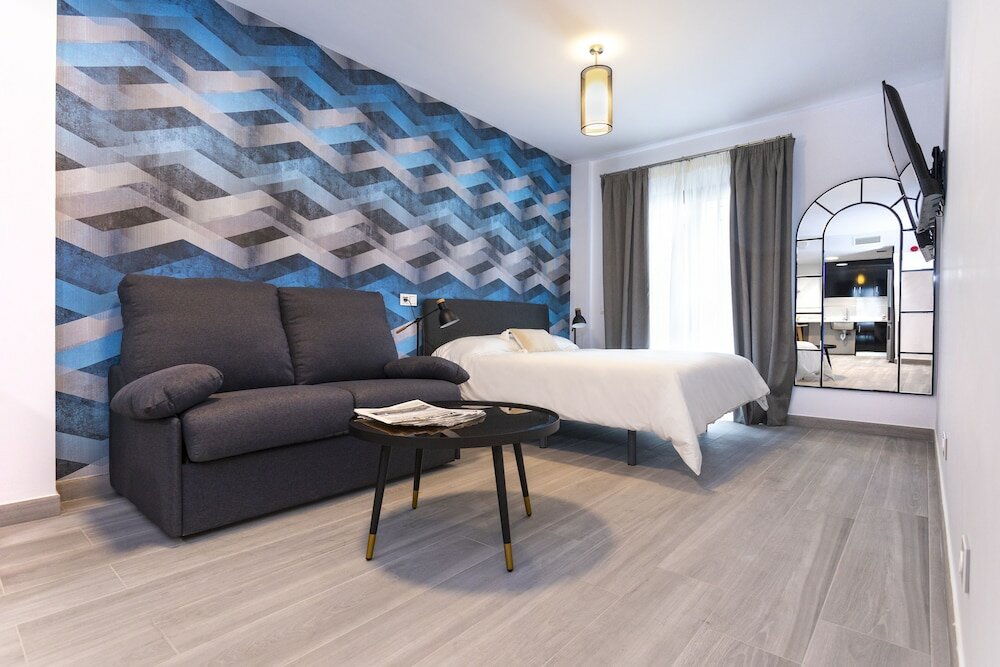 Фото Malaga Rivas 34 Suites Homes