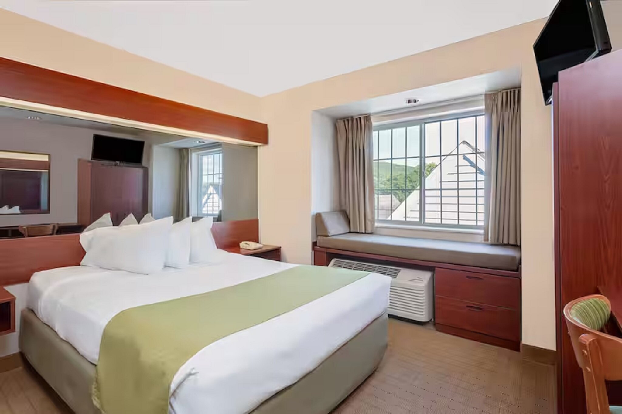 Фото Microtel Inn & Suites by Wyndham Wellsville