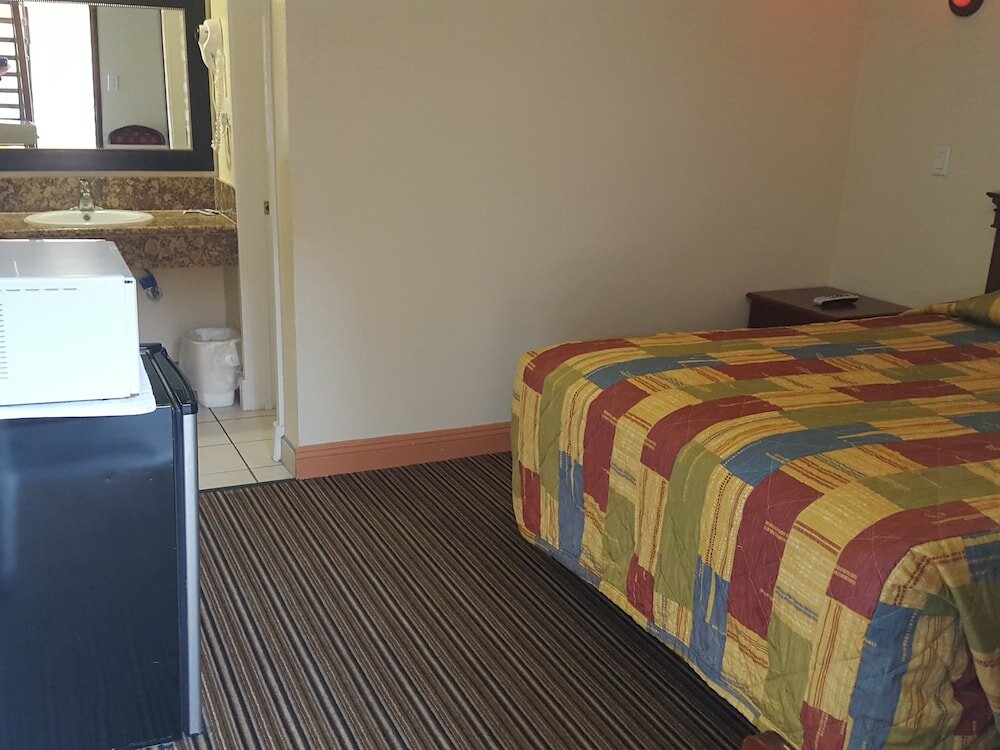 Фото Travel Inn Motel