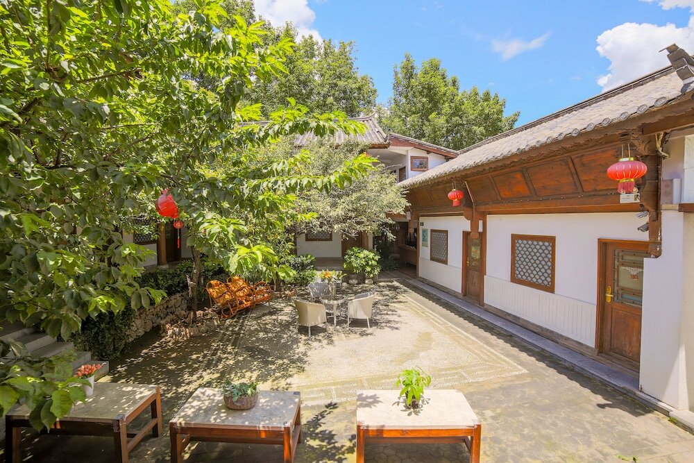 Фото Merry Inn Lijiang