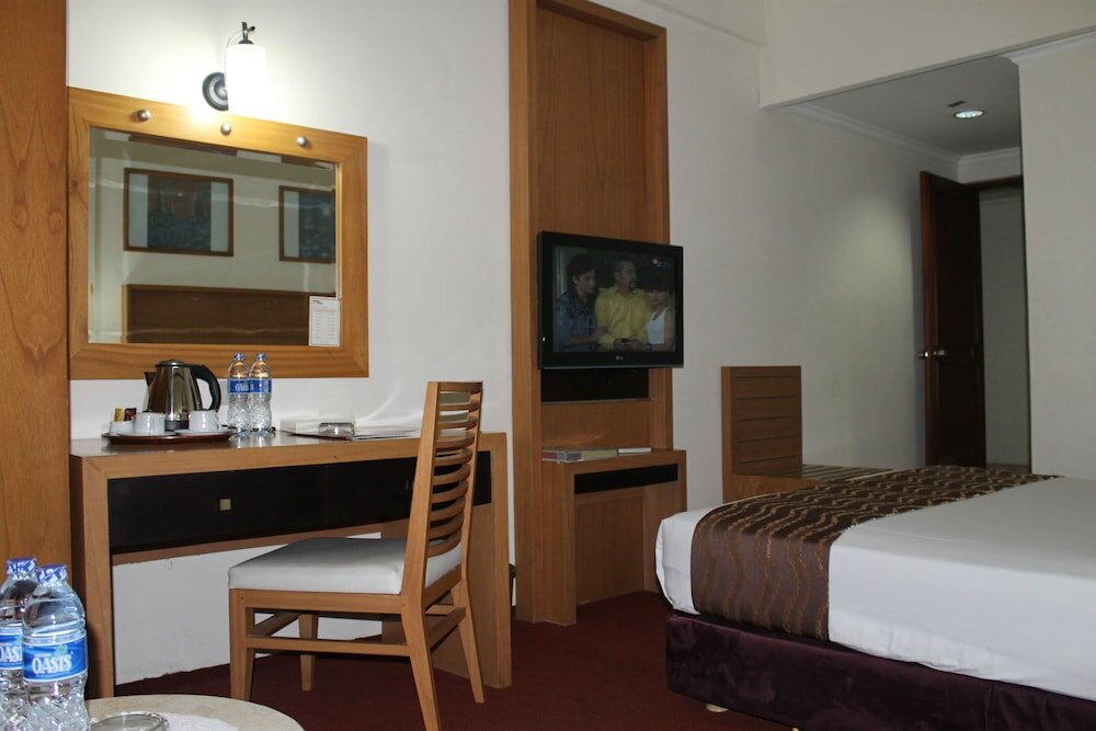 Фото Mega Matra Hotel