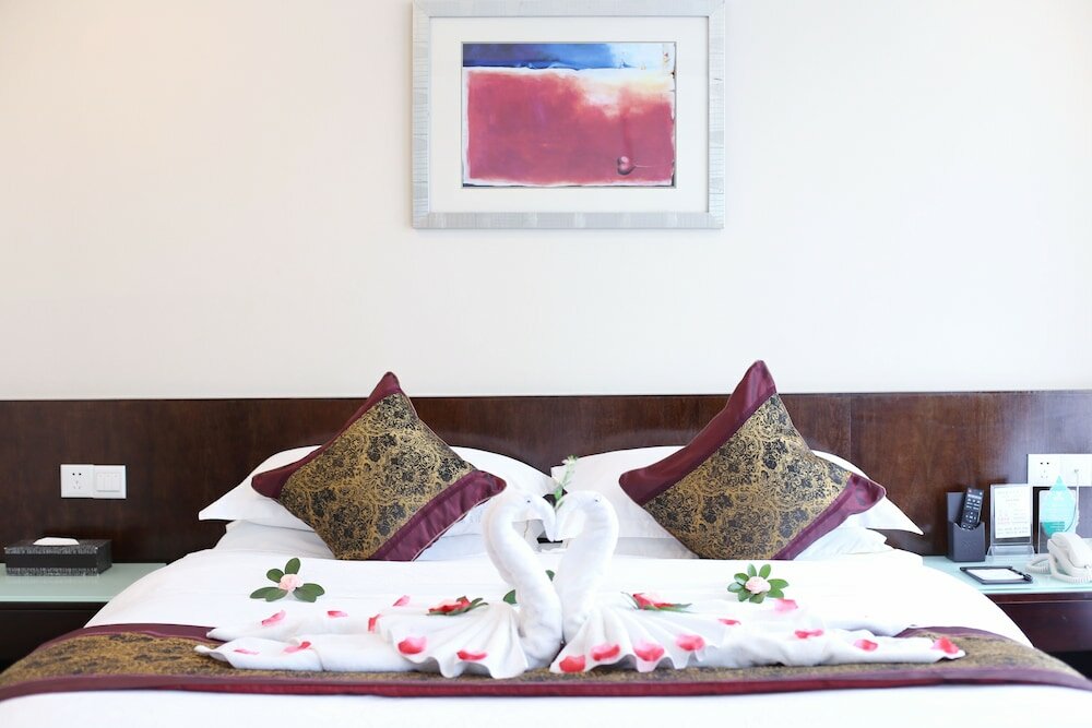 Фото Yihe Hotel Ouzhuang