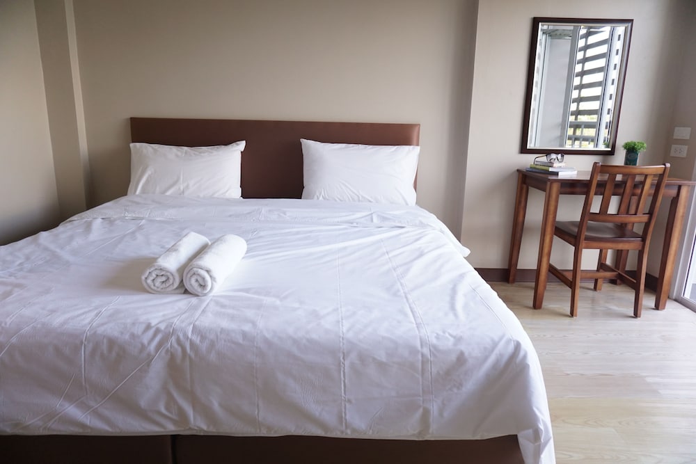 Фото Chompu Nakarin Apartment