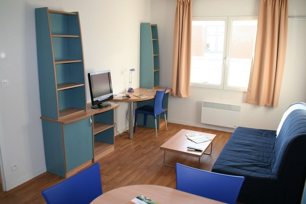 Фото Séjours & Affaires Reims Clairmarais