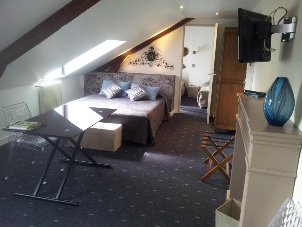 Фото Logis Hotel du Cerf