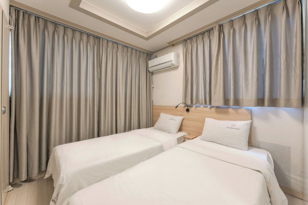 Фото Staywell Hotel