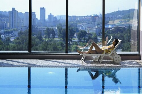 Гостиница Ruishi Hotel Dalian в Даляне