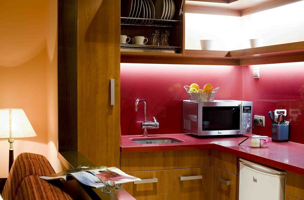 Фото Suites Gran VIA 44 Apartahotel